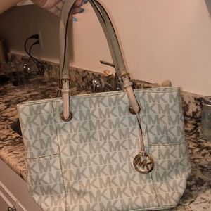 Used Authentic MK print purse. Lightly used!
